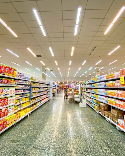 Supermarket aisle stocked with grocery products